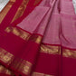 Pure silk kanchipuram rose pink color body with zari mayil chakram  buttas , raspberry pink  border with ornate Pallu