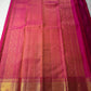 Kalpana  
Pure Silk Kanchipuram Saree  
Burnt Orange with Golden Buttas  
Intricate Magenta & Gold Zari Border