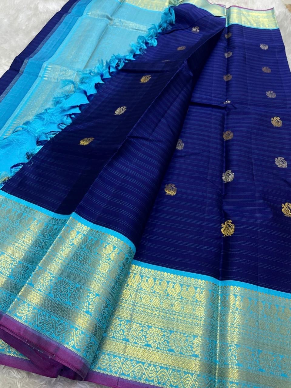 Ramya – Royal Blue Kanchipuram Pure Silk Saree with Zari Peacock Buttas, Sky Blue Varisaipet Border & Pastel Blue Pallu”