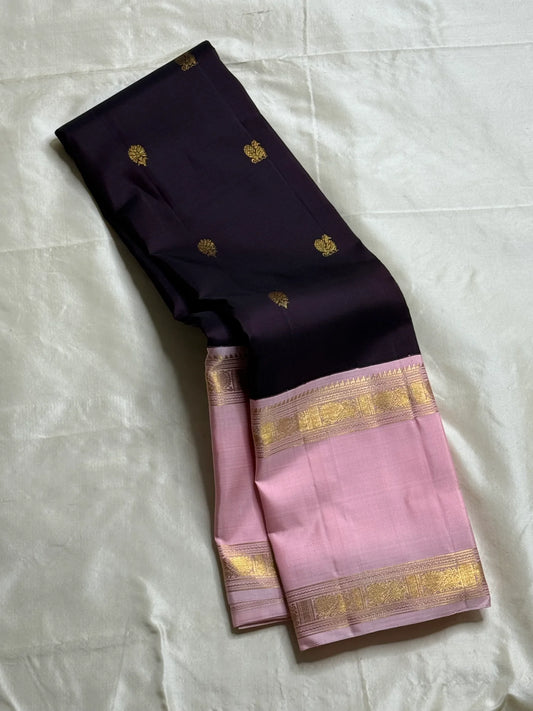 Rose Twilight – Pure Kanchipuram Silk Saree
Pastel Rose-Pink border with Golden Zari Weaves
Deep Plum-Violet Base Scattered with Gold Buttas
French Rose Rettapet Border in Lustrous Zari

Silk Mark Certified, delivery in 2 weeks