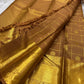Bronze Chakram — Kanchipuram Pure Silk

Warm caramel-brown body with grid checks & “chakram” buttas

Grand gold zari peacock border & glowing pallu (kaddi + paisley vine)

Silk Mark Certified | Free Shipping within USA

Dispatch in 1 Week