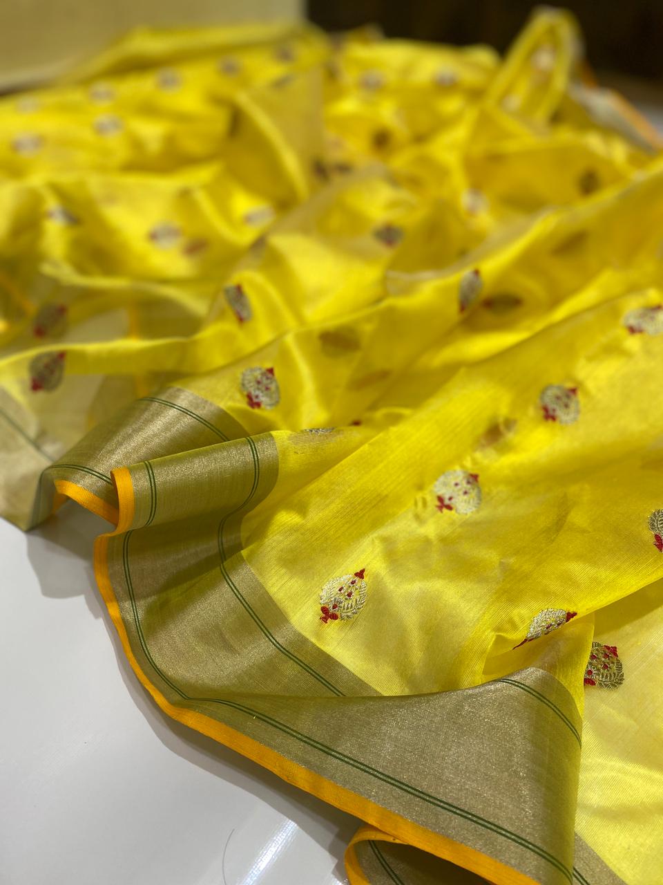 Pure Silk Chanderi – Marigold Yellow with Gold–Silver Buttas
Olive-Silver Kaddi Border & Shimmering Tissue Pallu ✨
Silk Mark Certified • Free Shipping within USA • Ships in Two Weeks