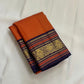Kesari Annapakshi Chakram
Pure Kanchipuram Silk Saree – Vibrant Kesari Orange Body with Gold Zari Chakram Buttas
Deep Purple Korvai Borders with Majestic Annapakshi & Floral Motifs
Grand Purple Zari Pallu. Silk mark certified , ships in 2 weeks
