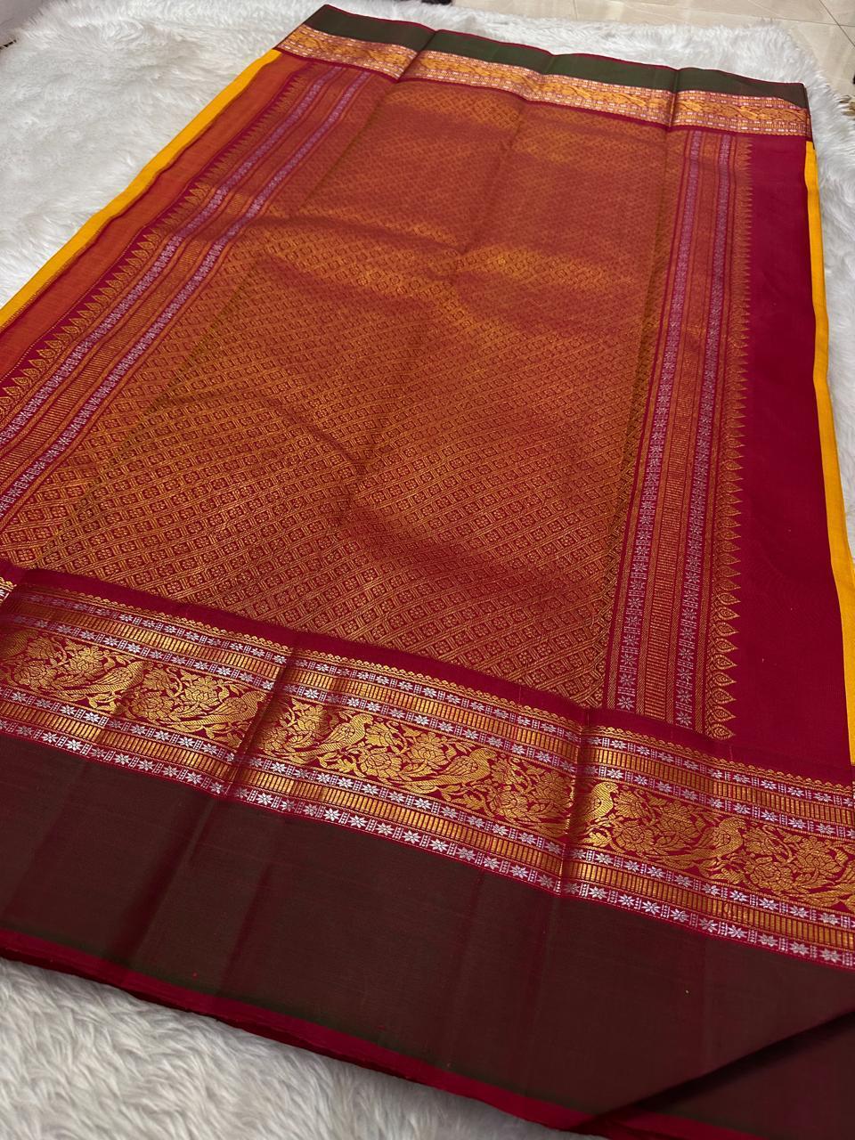 Sundaram - Bathed in the golden glow of ripe mangoes, this mambazham yellow silk saree features graceful vertical veldari stripes and delicate Sonarupa zari work. Woven with nature-inspired bird and foliage motifs