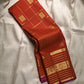 Pankajam 🌺 – Burnt Orange Kanchipuram Silk Saree with Zari Kattam, Dashed Lines, Kolam Motifs, Varisaipet Border with Thandavalam Zari Stripes, Rudrakshpet, Annam & Kamalam Motifs, Deep Magenta-Purple Selvedge & Ornate Pallu