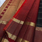 Kanmani Karuppu Kattam Ruby – Pure Kanchipuram Silk Saree
Deep black body with gold kattam checks & peacock buttas
Contrast ruby-red korvai borders
Grand ruby-red pallu with floral & lattice zari motifs
Silk Mark Certified | ships in 2 weeks