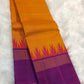 Open view of the orange silk body and contrasting purple Korvai border joined by pointed pink reku detailing.