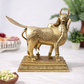 Back view of solid brass Kamadhenu sacred sculpture showing detailed wing engravings and traditional pedestal 8 inch