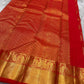 Tanvi – Vermillion Red Kanchipuram Pure Silk Saree with Floral Zari Jaal & Baavanji Border
Bold, radiant, and intricately woven varisaipettu Pallu