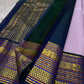 Mogra 💜✨🌿 – Lilac Kanchipuram Silk Saree with Gold Paisley Buttas, Navy Blue shot green Varisaipet Zari Border featuring Arai Madam, Vanki Pettu, Peacocks 🦚 & Contrast Silk Thread Accents