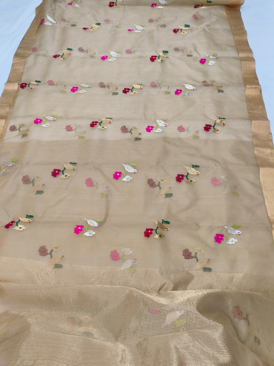 Pure Chanderi Silk Saree
Floral & Bird Embroidery on Sheer Gold-Beige
Tissue Zari Border • Lightweight • Elegant Drape