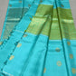 Aaral – Ice Blue & Spring Green Mubbagam Kanchipuram Pure Silk Saree with Mayil Chakram Buttas & Vanasringaram Grid Pallu