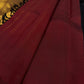 Maroon blouse piece and saree border with Ettukol weaving and gold zari work