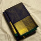 Krishna Shyama — Pure Silk Kanchipuram

Deepest purple “Shyama” body with Vairaoosi pinstripes

Temple-inspired antique gold zari borders with green selvedge

Grand striped zari pallu with hand-tied tassels

Silk Mark Certified • free shipping