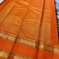 Nirupama ✨ – Bottle-Green Kanchipuram Pure Silk Saree
With Striking Saffron-Orange Korvai Contrast Border rettapet 
Adorned with Gold Rosette Buttas & Medallion Bands
Grand Zari Brocade Pallu in Cascading Motifs