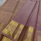 Lilac Mayil – Pure Kanchipuram Silk Saree
Ash-Lilac Body with Zari Kattam Checks & Buttas
Broad Antique-Gold Peacock Zari Borders
Grand zari Pallu 
Silk Mark Certified | Fall & Pico Done | Blouse Stitching Available | ships in two weeks Free