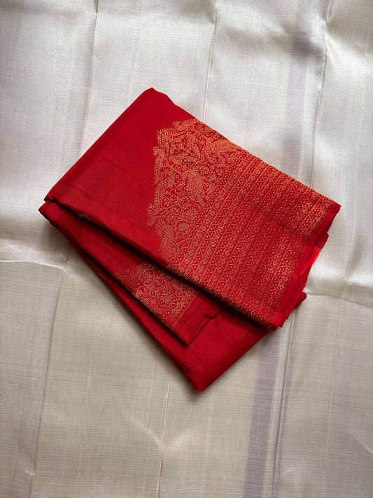 Scarlet Splendor – Pure Kanchipuram Silk Saree
Bridal-Red Body with Petite Gold Zari Buttas ✨
Regal Animal-Panel Border with Intricate Detailing
Grand Red–Gold Brocade Pallu with Lattice Jaal

Silk Mark Certified, delivery in 2 weeks