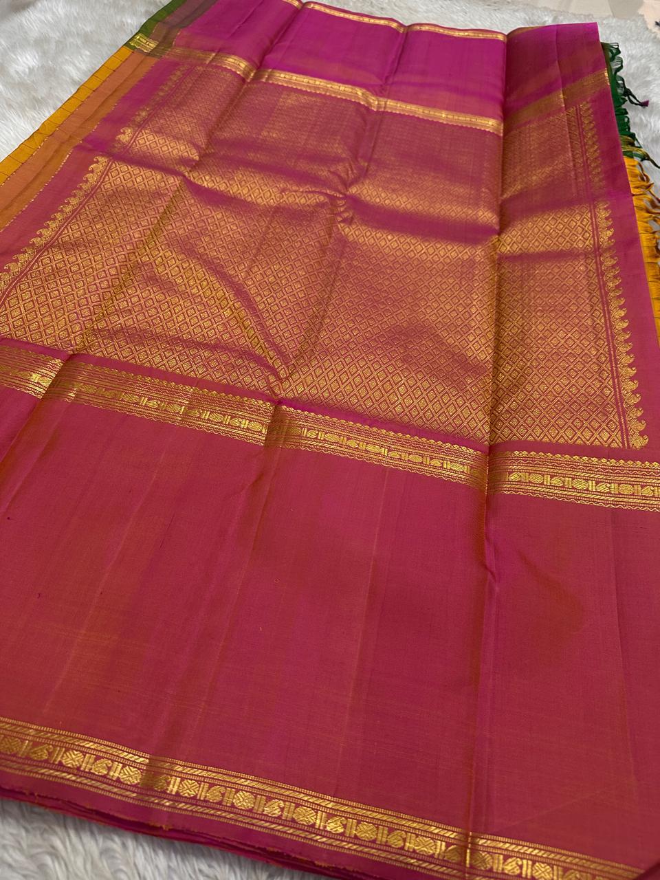 Kesari Checks — Pure Silk Kanchipuram Saree (almost -Mubbagam)
Saffron yellow body in grid kattam weave with radiant pink borders and zari detailing
Silk Mark Certified ✅ • Free USA Shipping • Ships in Two Weeks