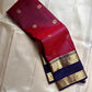 Anuraaga – Neelam

 — Pure Kanchipuram Silk

Vertical Pin-Stripe (Vairaoosi) Body • Gold Coin Buttas

Navy (Neelam) Korvai Border with Elephant Motifs

Diamond-Jaal Brocade Pallu • Running Contrast Blouse

Silk Mark Certified • free shipping in Two Weeks