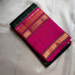 Rani Maragatham Zari Kattam — Pure Silk Kanchipuram (Handloom)
Emerald green body with fine gold kattam checks & zari lines • Vibrant rani-pink border with temple coin motifs
Rich rani-pink pallu with antique-gold zari panels • Silk Mark Certified ✅ Free