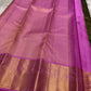 Iniya – Bottle Green & Pink Kanchipuram Pure Silk Saree with Floral Jaal and Mayil Border
Graceful and refreshing, Iniya is a handwoven masterpiece in bottle green with soft pastel pink accents. Delicate floral jaal and mayil motifs dance across the drape