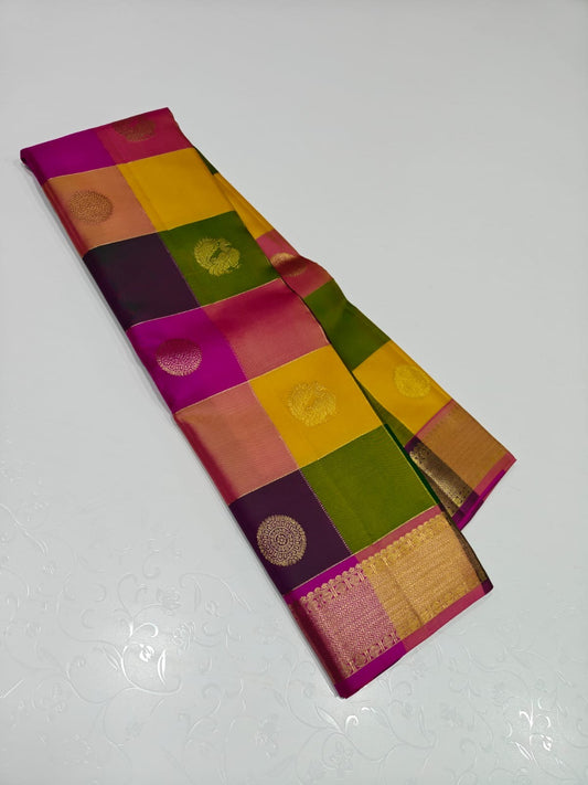 Navaratnam Paalum Palamum ✨ – Pure Kanchipuram Silk Saree
Multi-Color Kattam with Zari Mandala Buttas
Rani Magenta Korvai Border & Grand Zari Brocade Pallu
Contrast Rani Magenta Blouse with Matching Zari Border
Silk Mark Certified ✅ | Ships in 2 weeks