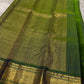 Hari Priya ✨ – Pure Kanchipuram Silk Saree
Royal Purple Body with Delicate Gold Zari stripes 
Emerald Green Korvai Contrast Border with Intricate Zari Weave
Grand Emerald Green Brocade Pallu with Traditional Motifs
Silk Mark Certified | Fall & Pico |