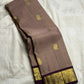 Full view of chikoo handwoven Kanchipuram silk saree with zari kattam and mayil butta — Idam Living