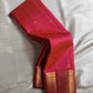 Tejas – Radiant Pink & Flaming Orange shot color Kanchipuram Silk Saree with Zari Kattam, Kamalam Buttas & Intricate Arai Maadam Pallu, Woven from an Exquisite Blend of colors