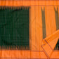 No-zari Kancheepuram silk saree with burnt orange contrast and Kanchi Kattam checks