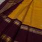 Bhanu – Mustard Gold Handwoven Kanchipuram Silk Saree with Deep Coffee Brown Borders, Intricate Elephant Motif Zari, and a Grand Temple-Inspired Pallu