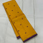 Manjal Vadamalli Chakram – Pure Kanchipuram Silk Saree

Marigold yellow body with purple floral thread buttas

Grand royal purple pallu with gold medallion zari & reku-style stripes

Handwoven Double Warp Weave | Silk Mark Certified | Fall & Pico Done