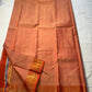 Mandara Peach – Pure Korvai Kanchipuram Silk Saree
Soft peach shot body with dainty gold chakram buttas
Vermilion-orange korvai borders with peacock medallions
Grand kumkumam red pallu with full zari brocade & temple panels
Silk Mark Certified | Free Ship
