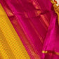 Swarna Kattam Ganga Jamuna — Pure Silk Kanchipuram Saree
Golden mustard kattam checks body • Dual korvai borders in rani pink & emerald green
Rich zari pallu with radiant festive sheen
Contrast emerald blouse with zari selai finish
Silk Mark Certified •