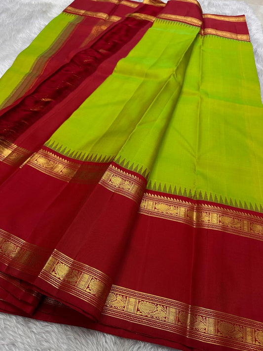 Ramani – Lime & Grass Green Pure Kanchipuram Silk shot color Saree with Red Rettapet Border with mayil zari motif and Rich 2G Zari Pallu