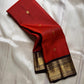 Crimson Earth – Red & Deep Brown Kanchipuram Pure Silk Saree ✨
Radiant Red Body with Golden Zari kamalam  Buttas
Deep Brown Korvai Border with Peacock Motifs
Majestic Brown Pallu with Ornamental Zari Weaving

Silk Mark Certified, delivery in 2 weeks