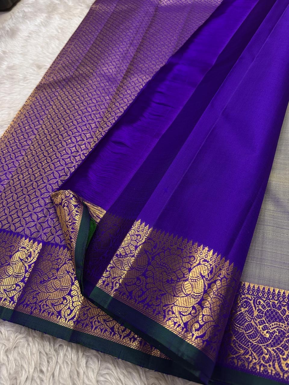 Smoky Lavender
Pure Kanchipuram Handloom Silk Saree
Gold Peacock Zari • Korvai Grandeur