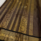 Shyama Kamalam—espresso-black Kanchipuram silk with vairaoosi stripes, lotus buttas, peacock-brocade borders & rich brocade pallu. Silk Mark. Free USA shipping.