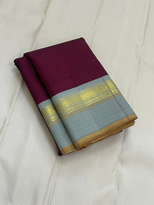 Deep Ruby Dove Grey – Pure Silk Kanchipuram Saree
Korvai Weave with Elegant Contrast Borders
Golden Zari detailed Pallu
Silk Mark Certified | Fall & Pico Done | Blouse Stitching Available ($30)