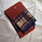 Rust Orange Neelam – Korvai Kanchipuram Silk Saree

Pure handloom silk | Rust-orange micro checks with gold chakram buttas

Neelam korvai border with annam chakram motifs & temple stripes

Grand zari-brocade neelam pallu | Contrast blouse | Fall & Pico Do
