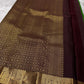 Shringaram – Green — Pure Silk Kanchipuram

Emerald-green body with coin buttas & grand mango (mankolam) motifs

Deep coffee-brown korvai borders with peacock panel zari

Rich coffee-brown brocade pallu with circular & diamond jaal

Silk mark