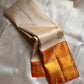 Champa Venpattu — Pure Kanchipuram Handloom Silk Saree
Ivory Champa Body • Marigold-Orange Zari Borders
Heirloom Silk · Temple-Ready Elegance