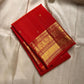 Fiery orange red shot double  color small flower motif with vanasringaram and Rudhraksham border pure silk mark certified Kanchipuram saree