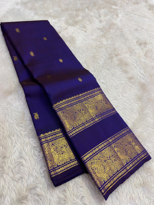 Royal Indigo and Antique Gold Handwoven Pure Silk Kanjeevaram Saree with Rettapet Border and Mayil Chakram Butta
