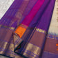 Vaidhehi – Ivory Kanchipuram Silk Saree
A classic ivory silk saree with a shot purple-orange Rudraksham border and a rich Thazhampoo reku pallu—timeless elegance woven with tradition