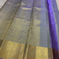 Dia ✨ – Unique Ash Lilac Grey Kanchipuram Pure Silk Saree
Gold Zari Buttas Adorning the Body
Intricate Gaja–Annam (Elephant & Peacock) Motif Border
Coordinated Ash Lilac Grey Silk Blouse Piece Included
Silk Mark Certified | Fall & Pico Done