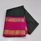 Emerald Fuchsia Zari kattam – Pure Kanchipuram Silk Saree
Zari Kattam Checks All Over the Body ✨
Rani-Pink Rettapet Border with 2G Gold Zari
Grand Brocade Pallu in Contrast Rani-Pink

Silk Mark Certified, delivery in 2 weeks