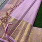 Vibrant green Zari kattam with pastel pink border peacock motif and Pallu