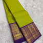 Handwoven Kanjeevaram silk saree featuring antique gold Annapakshi weaving on indigo blue border