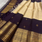 Handwoven Kanjeevaram silk saree featuring deep purple body and luminous champagne gold pallu